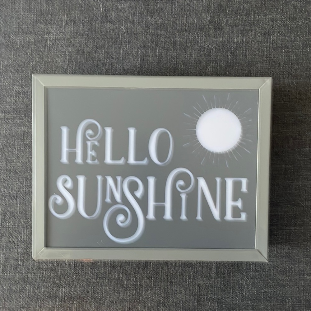 light up sign.  Can hang on wall or sit on shelf.  Needs batteries